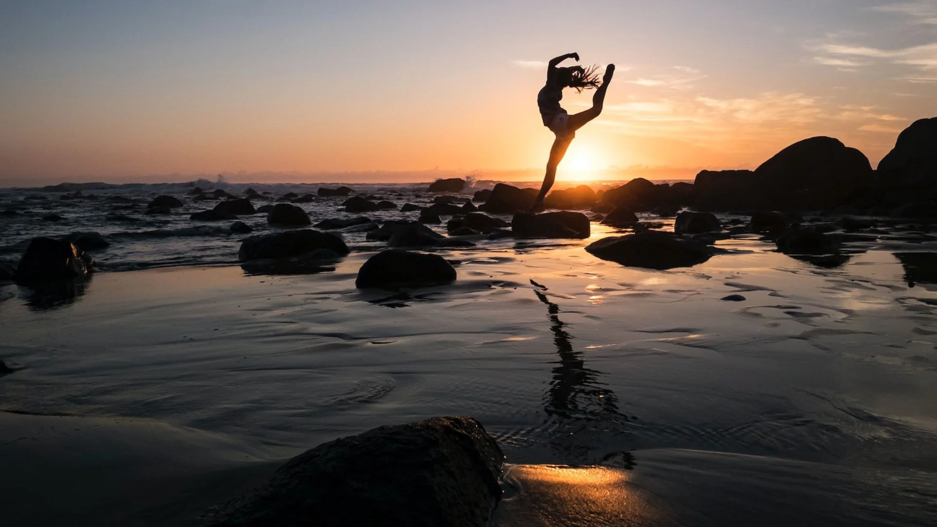 woman dancing on a sunset beach, visionary somatic dance, niio dance