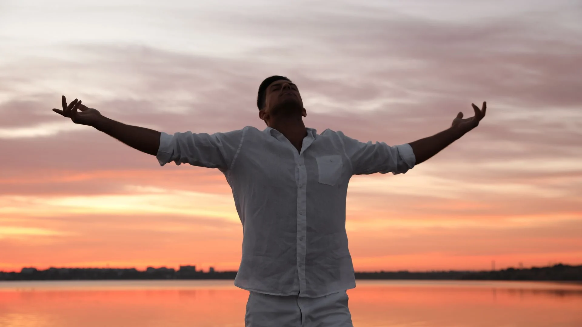 man with outstretched arm, embodied practice